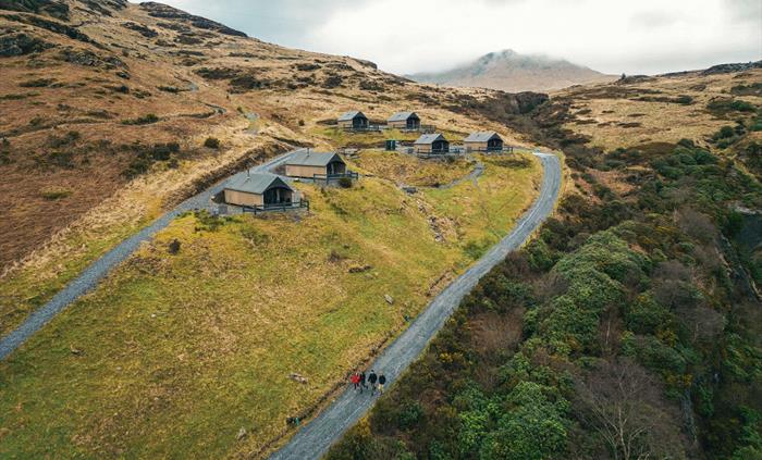 Llechwedd Glamping pods at Plas Weunydd on the side of the mountain